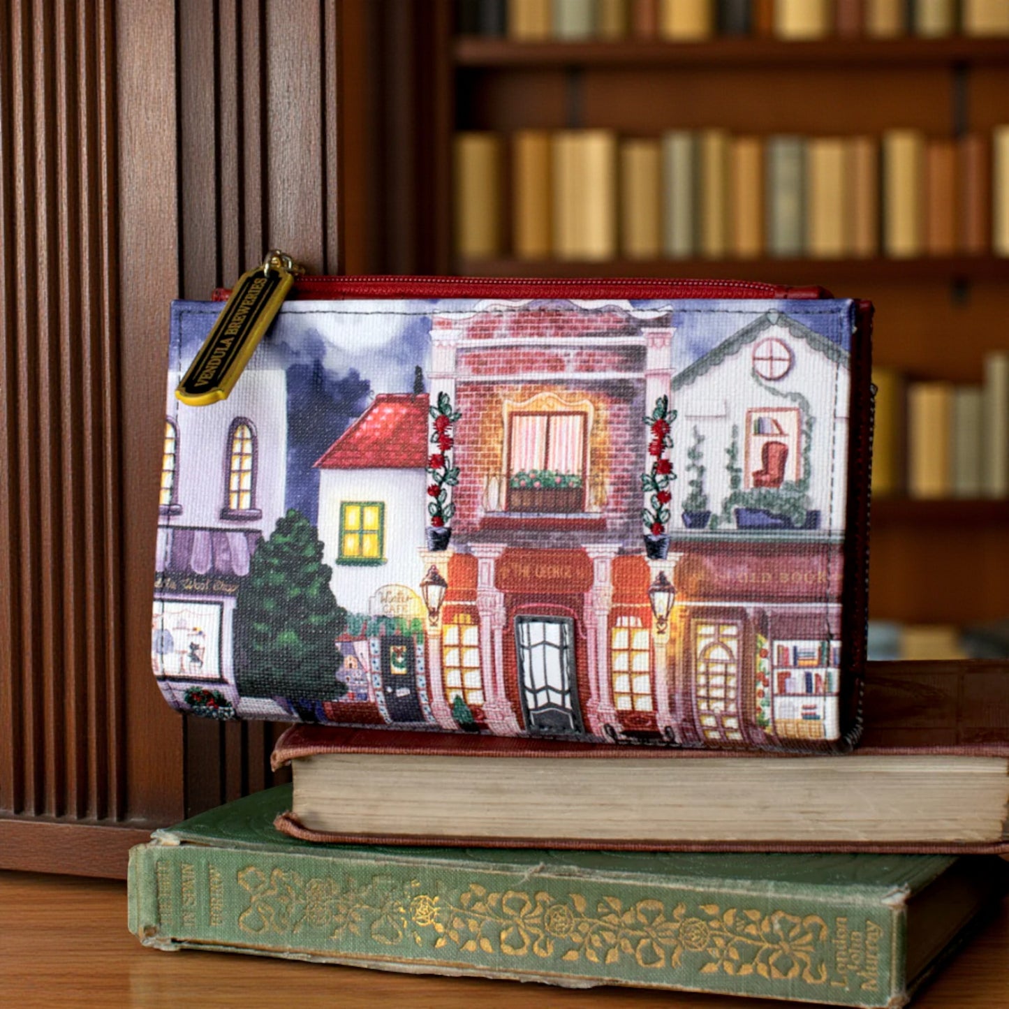 CARTERA DOBLADA SUAVE CHEERS STREET de Vendula London , sobre libros