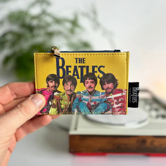 Monedero Sgt. Pepper de los Beatles en Maldita Rita, detalle de los 4 beatles