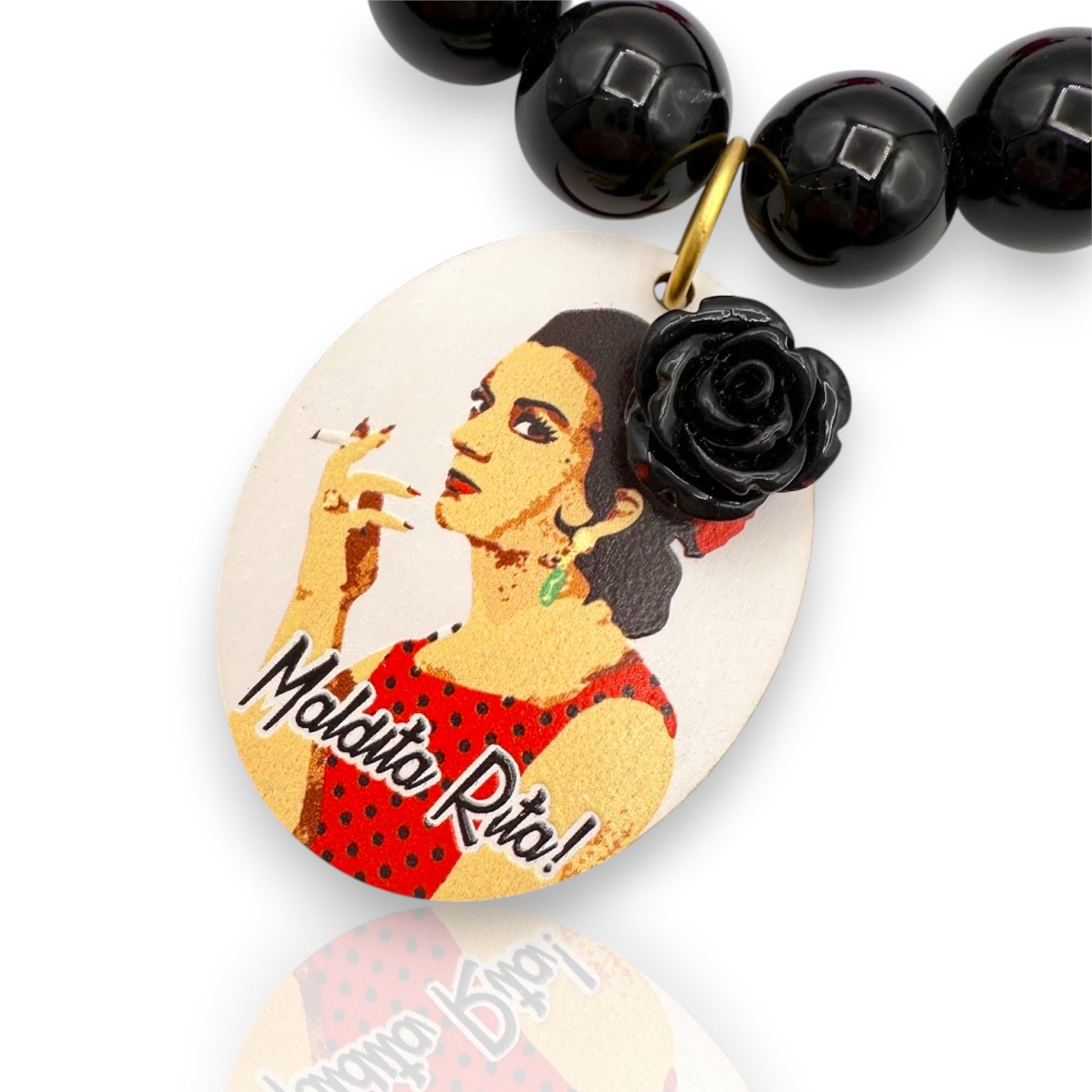 Collar Lola de Maldita Rita, detalle de cara de Lola Flores con flor negra