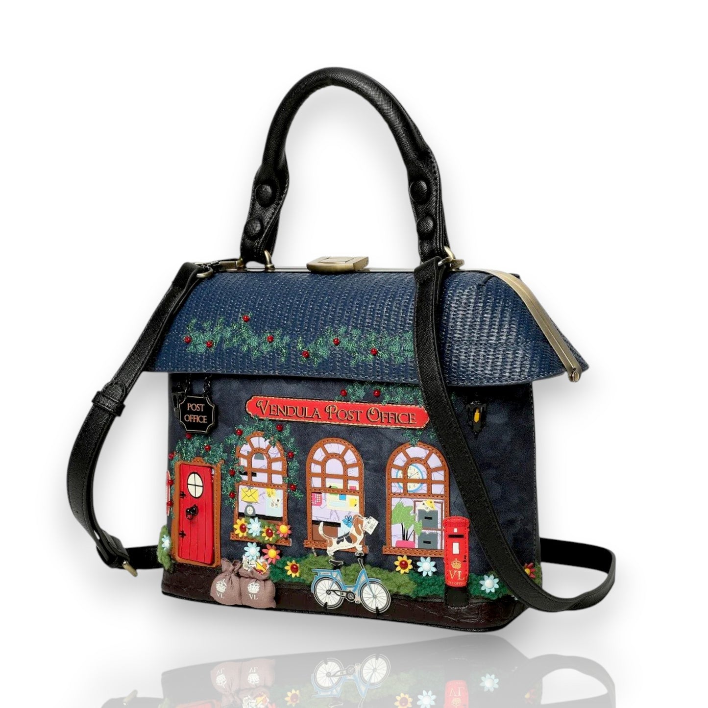 Bolso de mano The old Post Office Navy Edition de Vendula London, venta en Maldita Rita Almería, vista lateral.