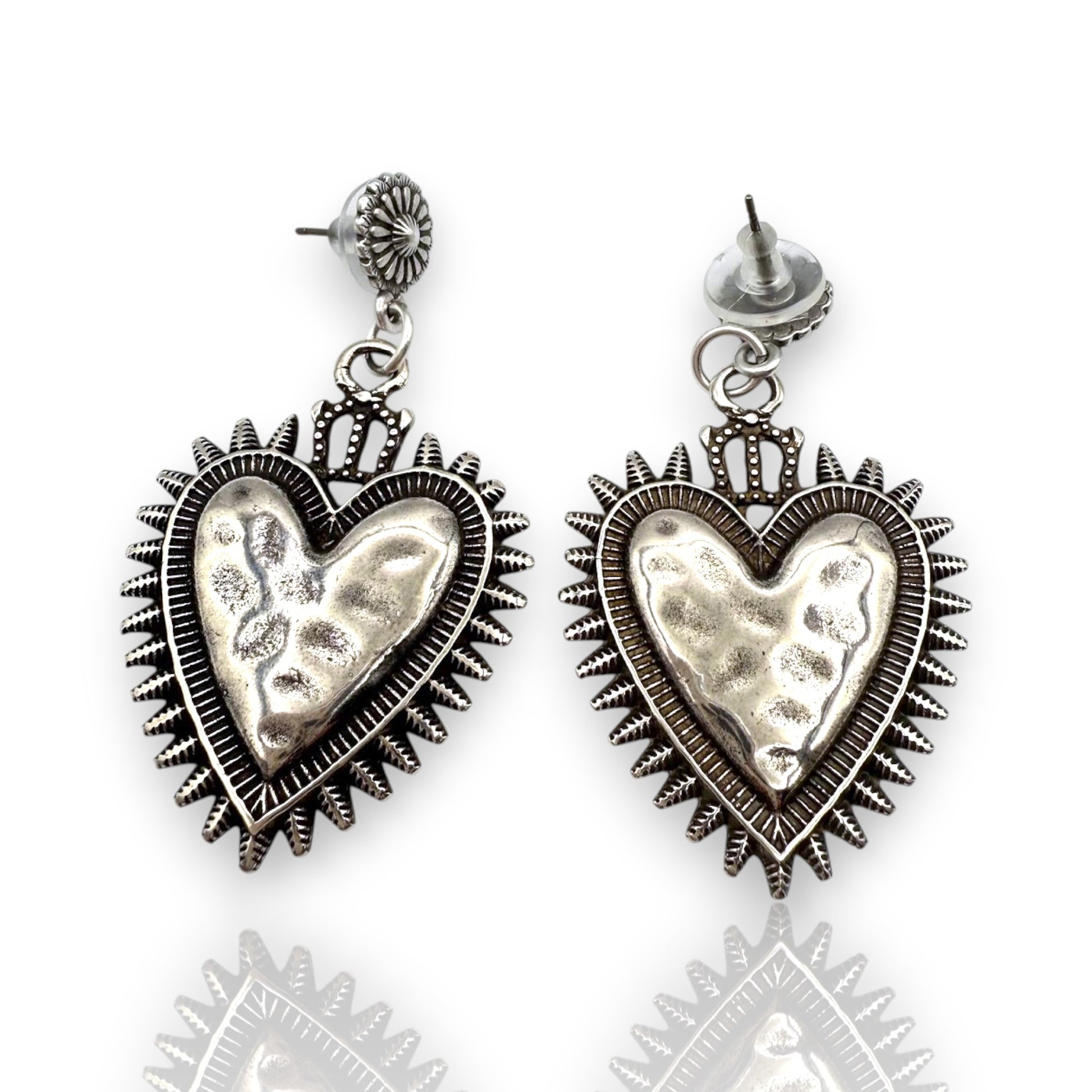Pendientes Milagrito plata de la marca Maldita Rita, detalle cabezal