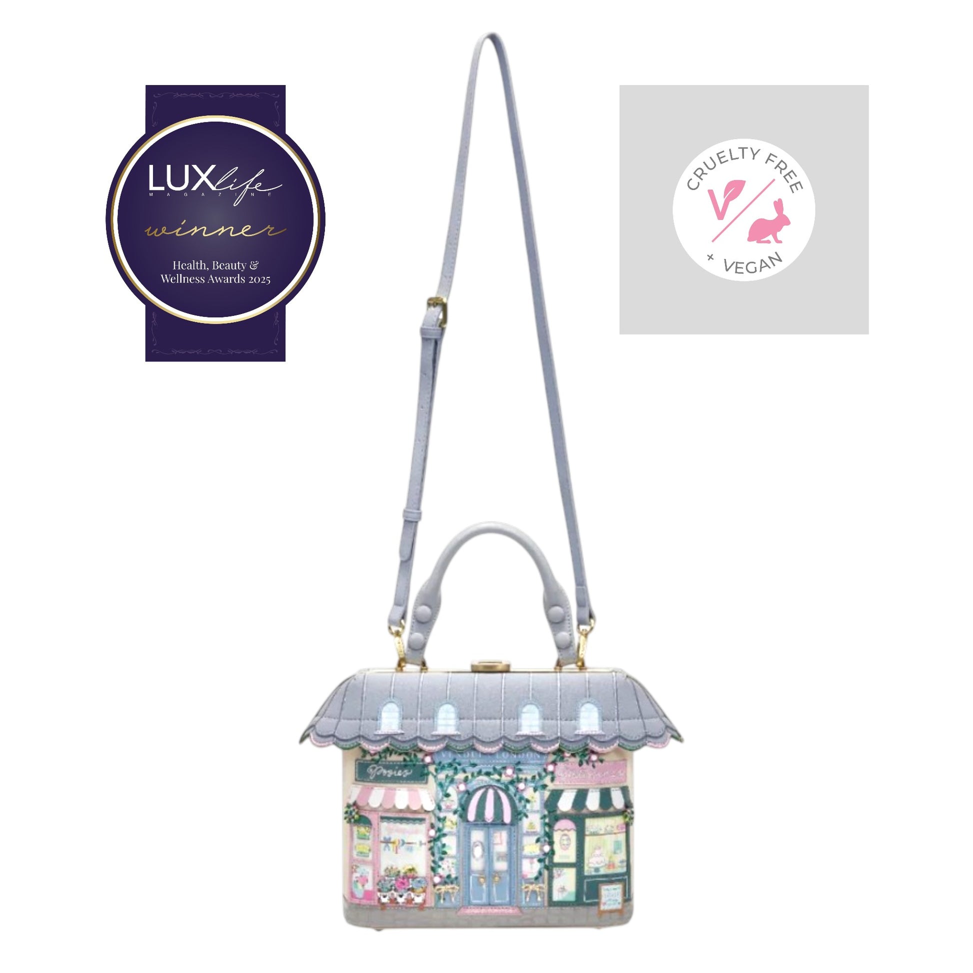 BOLSO DE MANO POSIES AND PATISSERIES de Vendula London, venta en Maldita Rita. con la bandolera puesta.