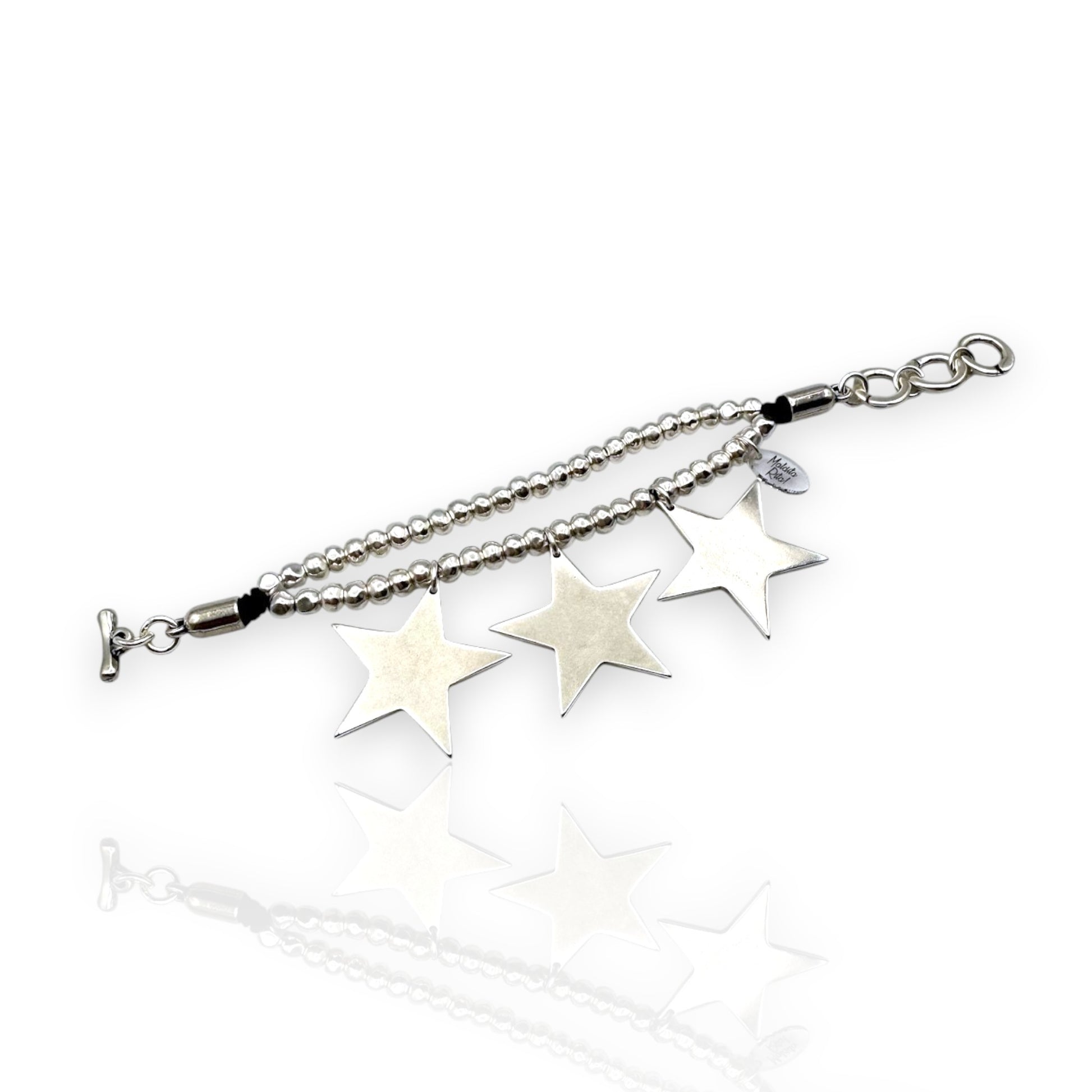Pulsera Black Star de Maldita Rita, en plata con estrellas, extendida