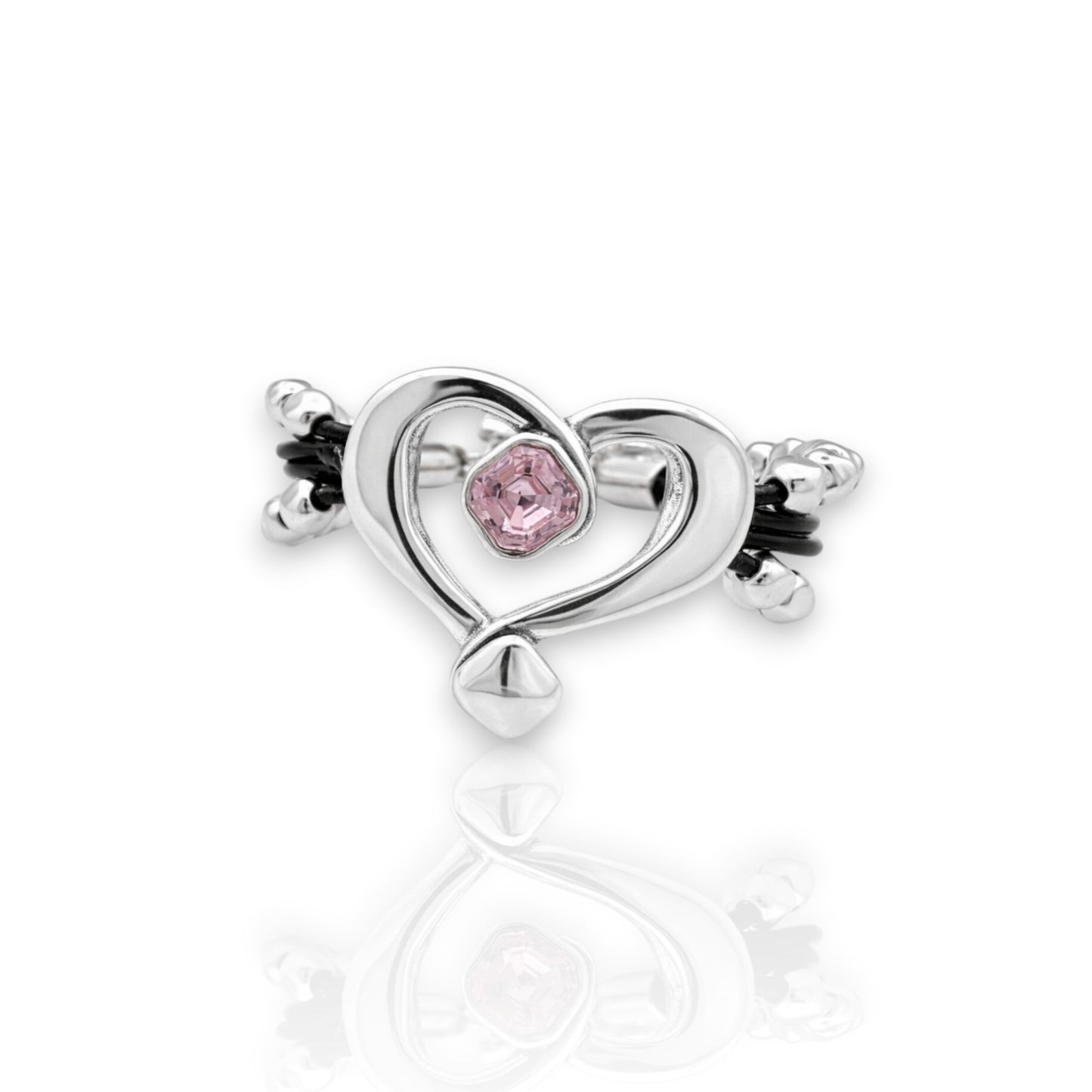 Pulsera de cuero y bolasde plata con corazón hueco y cristal de Swarovki rosa, de la marca Maldita Rita. Detalle del cristal.