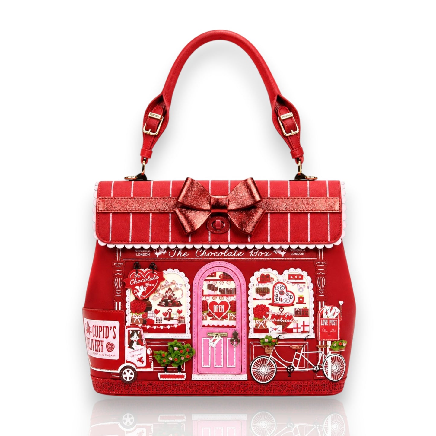 The Chocolate Box, bolso Grace de Vendula London y venta en Maldita Rita. Bolso rojo de tienda de bombones.