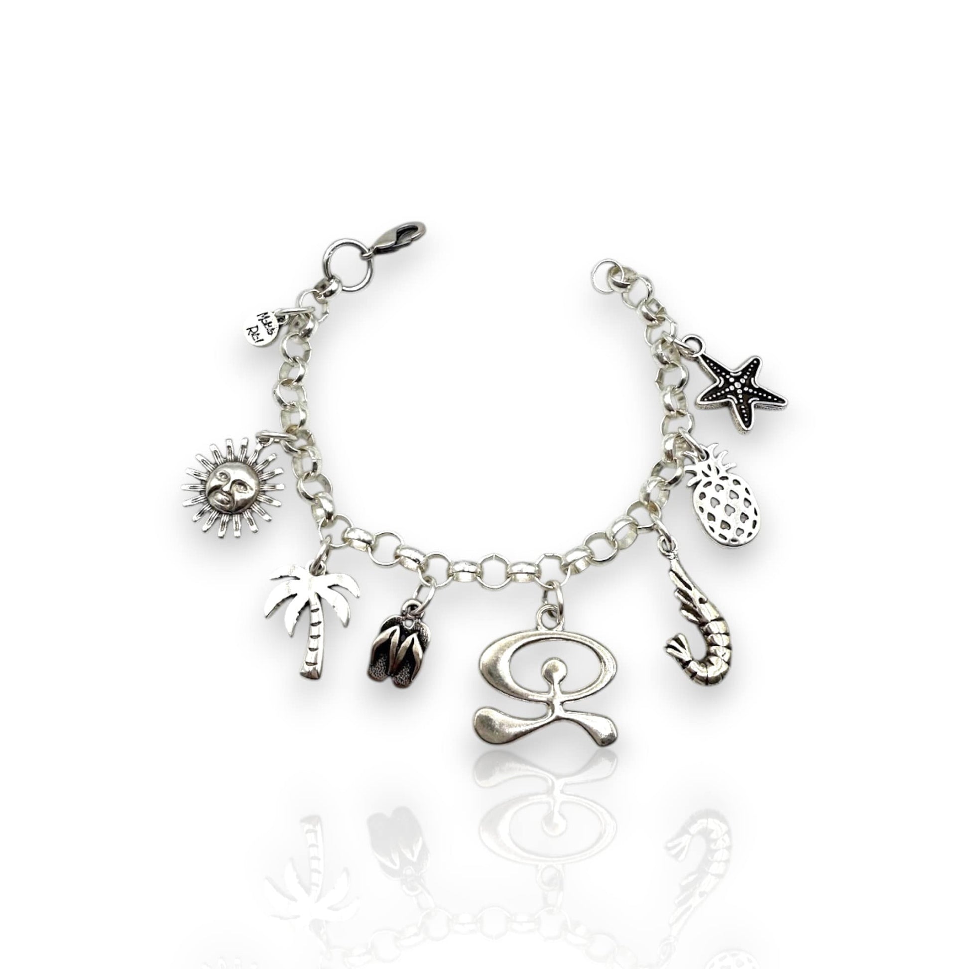 Pulsera de cadena con colgantes temáticos de Almería, chanclas, palmera, sol de Portocarrero, Indalo. Diseño de Maldita Rita Joyería